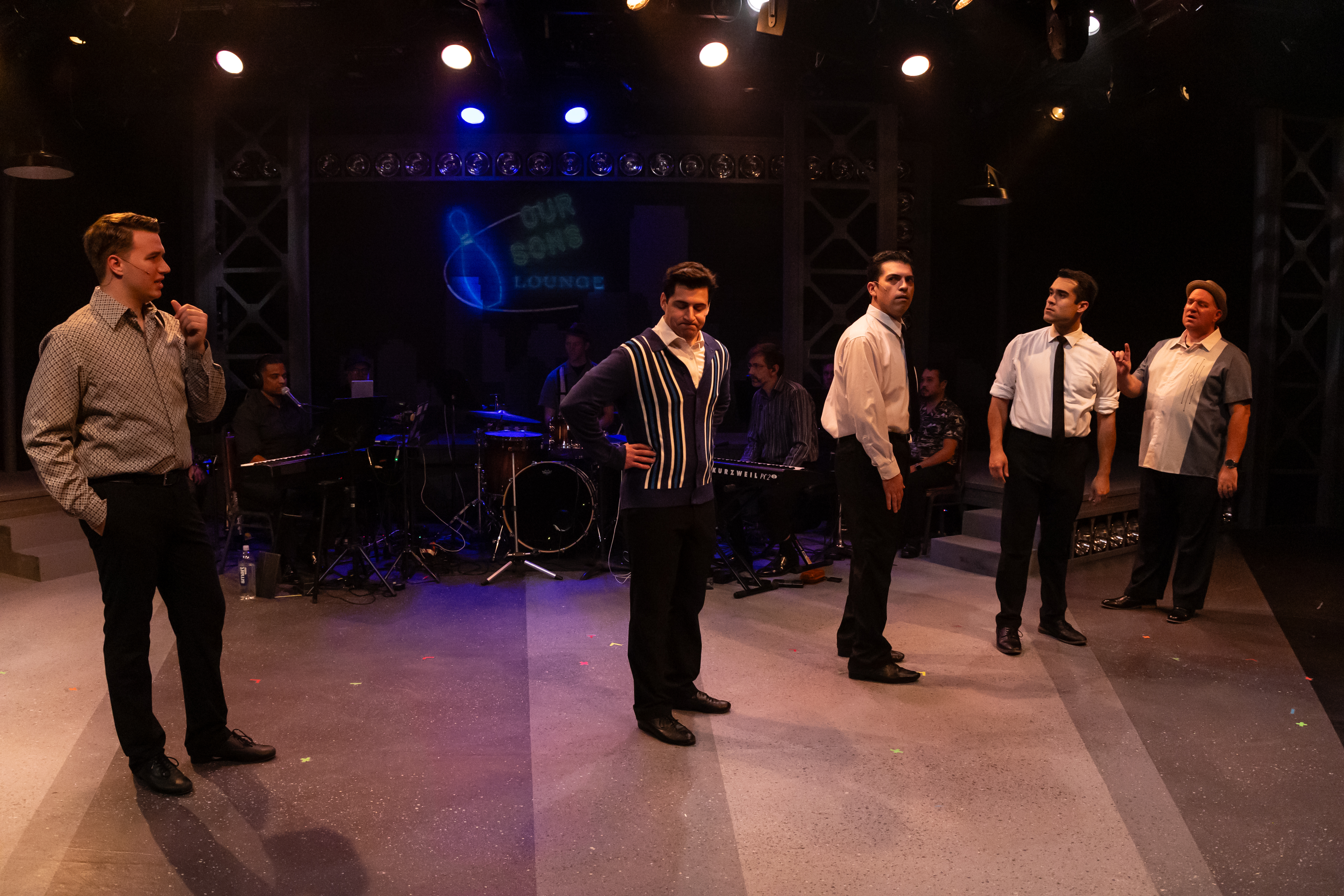 A bowling alley owner (David Kincannon) declines the Four Lovers a gig.